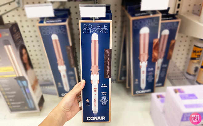 A Person is Holding Conair Double Ceramic 1 Inch Curling Iron