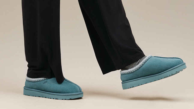 A Person wearing UGG Tazz Platform Slippers in Deep Ice Color