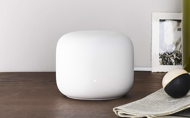 Google Nest Home Wi Fi Extender on a Table