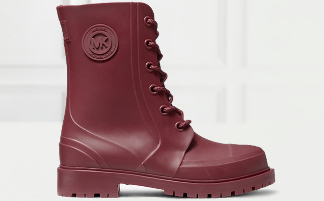 Michael Kors Montaigne PVC Rain Boot in Dark Berry Color on the Table