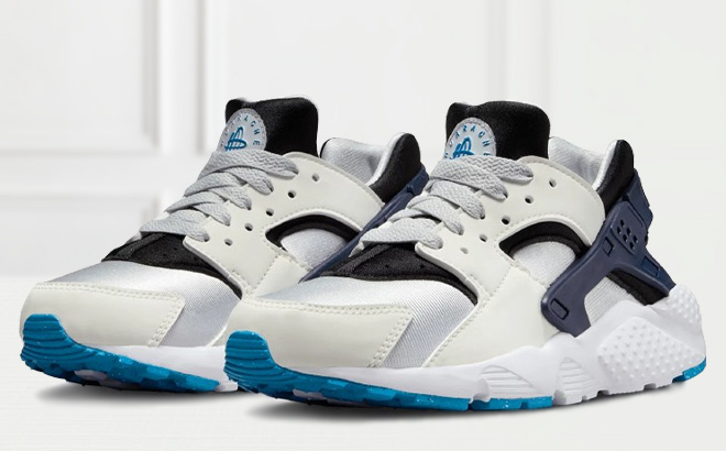 Nike Kids Grade School Huarache Run Shoes on the Table