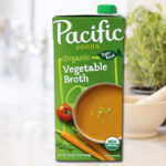 Pacific Foods 32 oz Vegetable Broth on a Kitchen Counter