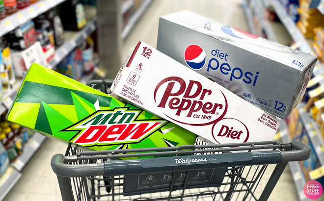 Three Soda 12 Pack Boxes in a Walgreens Cart