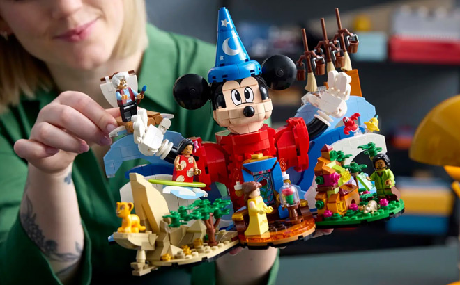 Woman holding Magic of Disney Set