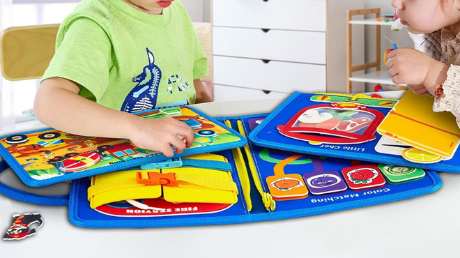 A Girl and Boy Playing with the Montessori Busy Board Toy