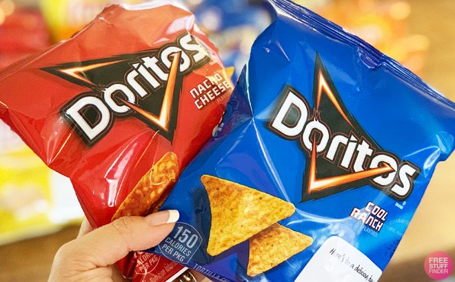 A Person Holding a Bags of Doritos Nacho Cheese and Cool Ranch Chips