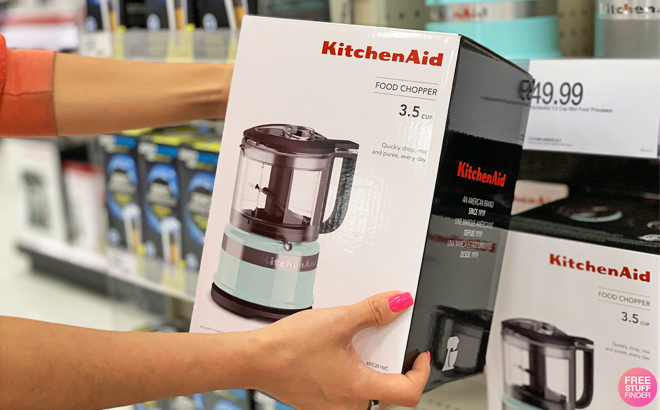 A Person Holding a KitchenAid Food Chopper in Aqua Sky