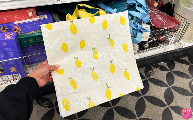 A Person Holding a Reusable Bags in White Lemon Design