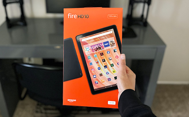 A Person Holding an Amazon Fire 10 HD Tablet