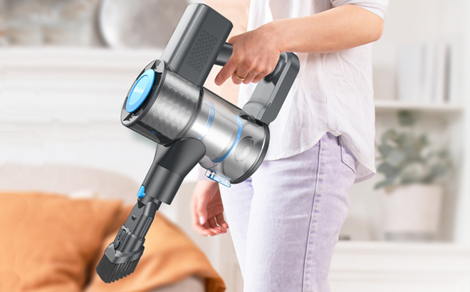 A Person Holding the Cordless Lightweight Vacuum Cleaner