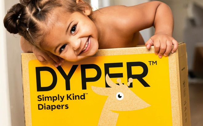 A Smiling Toddler Girl Leaning on a Dyper Diaper Monthly Box