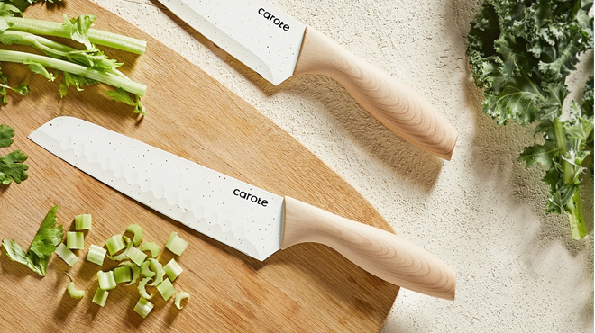 Carote 12 Piece Knife Set on Top of a Chopping Board