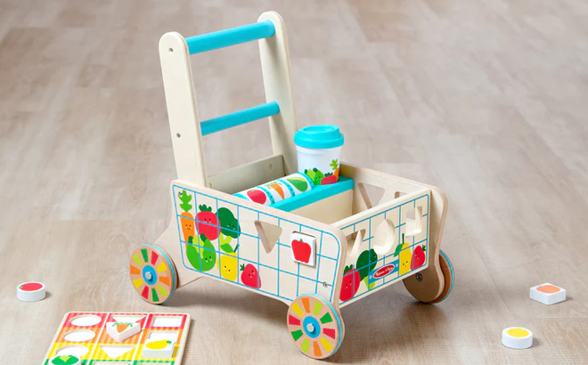 Melissa & Doug Wooden Shape Sorting Grocery Cart Push Toy