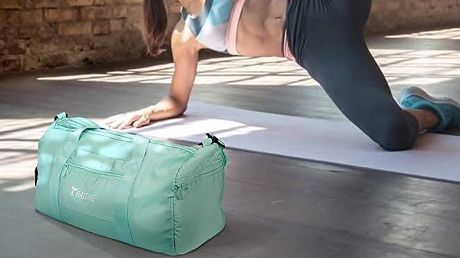 A Baleine Gym Bag beside a Lady Performing Yoga Pose