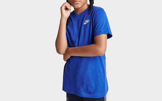 A Boy Wearing Nike Sportswear Logo T Shirt