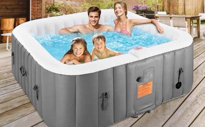 A Family Sitting in the Segmart Inflatable Hot Tub Spa