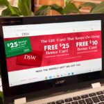 A Laptop Screen Showing the Free Bonus Card Promo Banner at DSW