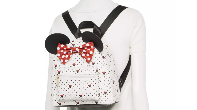 A Mannequin Wearing Disney Minnie Mouse Mini Backpack with Glitter Bow and 3D Ears