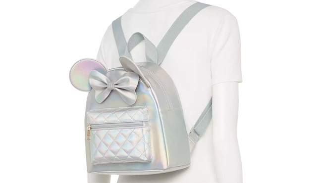 A Mannequin Wearing Disney Minnie Mouse Pearl Iridescent Mini Backpack