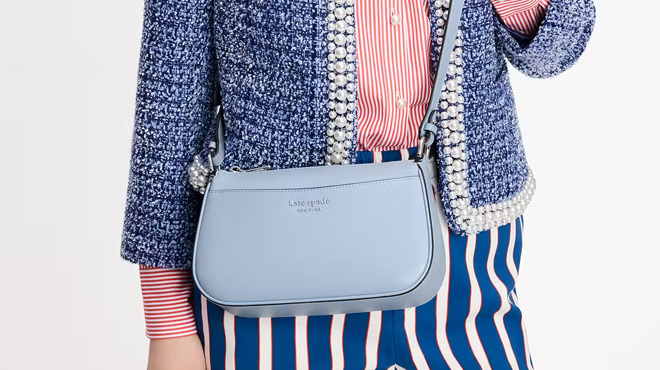 A Person Carrying a Kate Spade Bleecker Small Crossbody