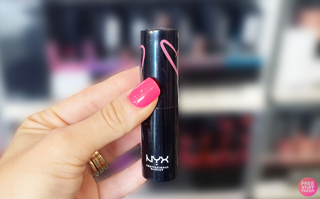 A Person Holding NYX Shout Loud Satin Lipstick