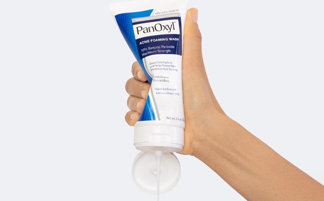 A Person Holding PanOxyl Acne Foaming Wash