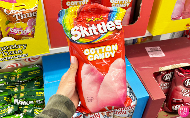 A Person Holding Skittles Cotton Candy