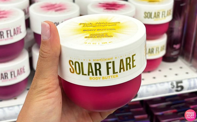 A Person Holding Solar Flare Body Butter Hibiscus Dragonfruit