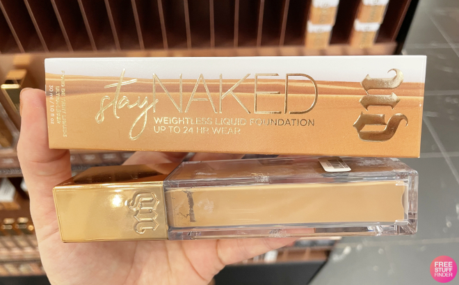 A Person Holding Urban Decay Stay Naked Weightless Foundation