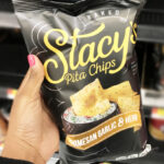 A Person Holding a Bag of Stacys Parmesan Garlic Herb Flavored Pita Chips