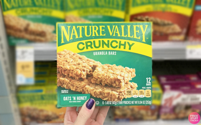 A Person Holding a Box of Nature Valley Crunchy Oats n Honey Granola Bars