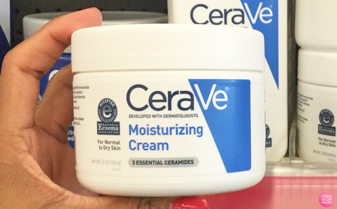 A Person Holding a Cerave Moisturizing Cream