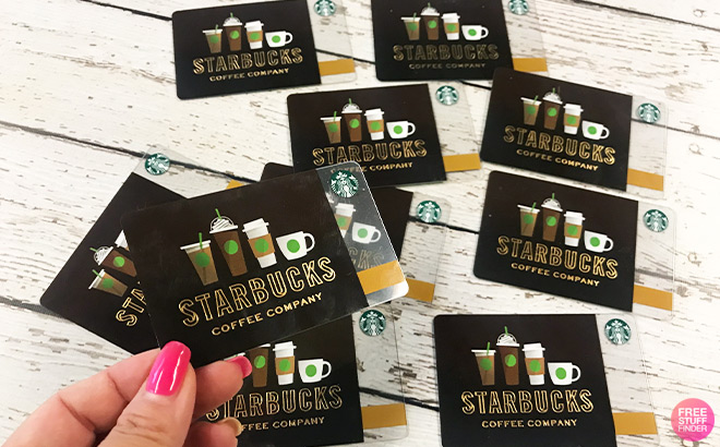 A Person Holding a Starbucks Gift Card