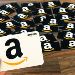 A Person Holding an Amazon Gift Card