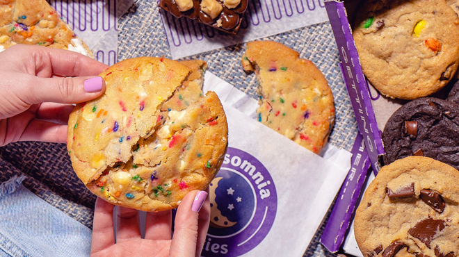 A Person Holding an Insomnia Cookie