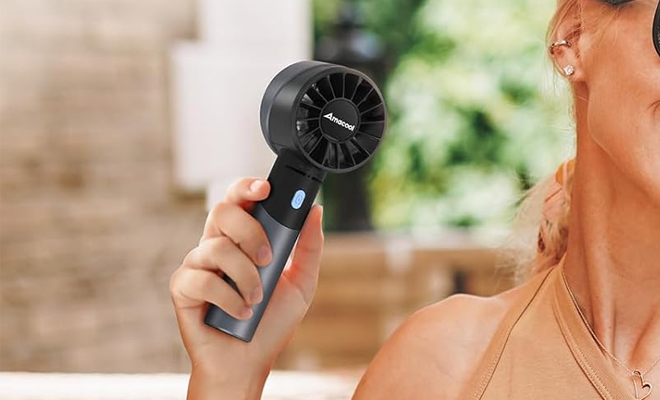 A Person Holding the Portable Handheld Turbo Fan