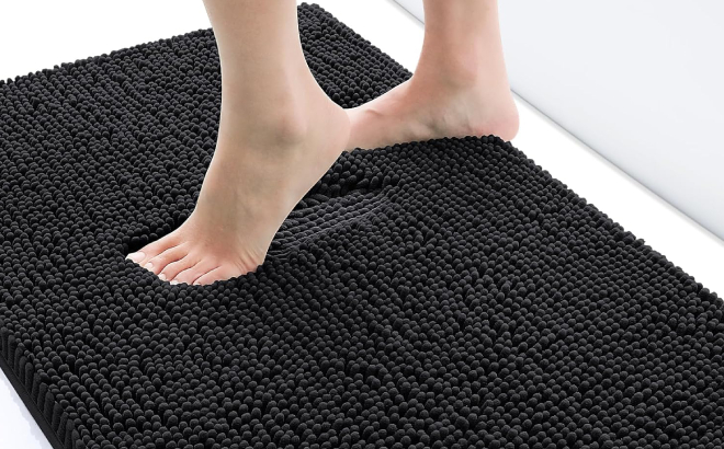 A Person Steeping on a Smiry Luxury Chenille Bath Rug