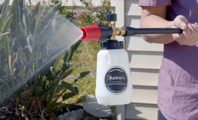 A Person Using the AstroAI Heavy Duty Foam Cannon for Pressure Washers