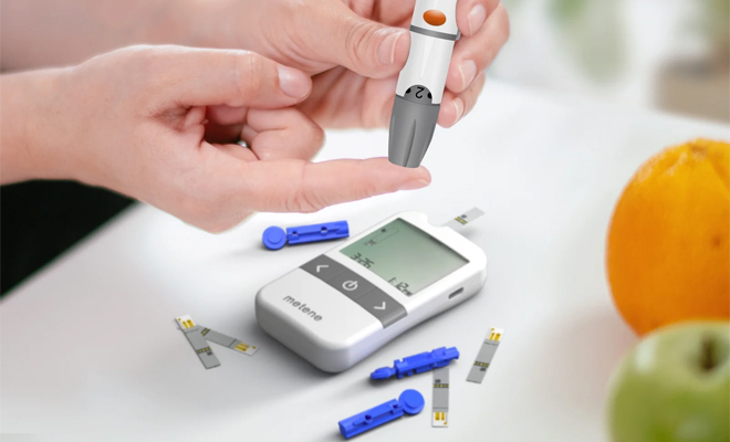 A Person Using the Metene Blood Glucose Monitor Kit