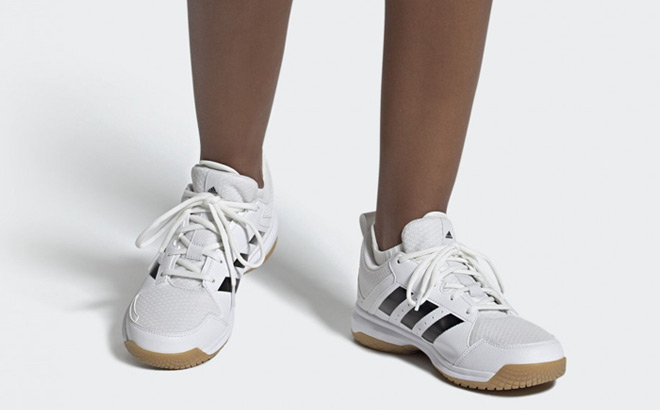 A Person Wearing Adidas Womens Ligra 7 Indoor Shoes