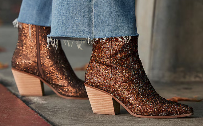 A Person Wearing Betsey Johnson Emory Rhinestone Western Boots