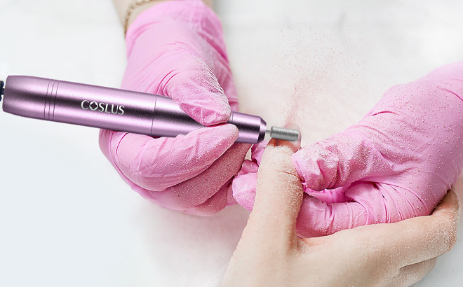 A Person Working With Coslus Electric Nail Drill Kit