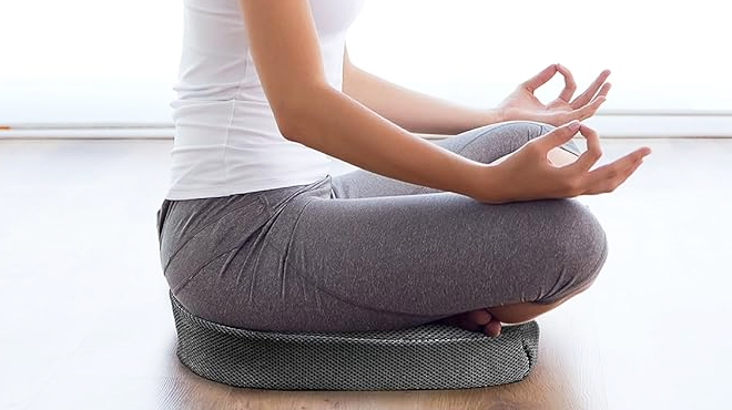 A Woman Sitting on a Gel Seat Cushion