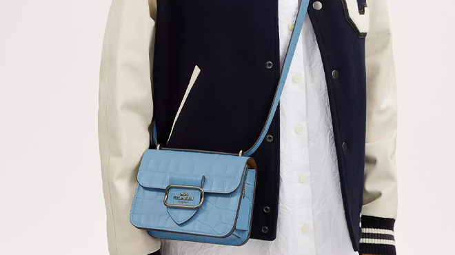 A Woman Wearing Coach Outlet Morgan Square Crossbody