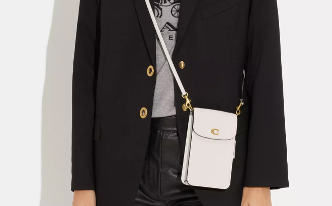 A Woman Wearing Coach Outlet Phone Crossbody Bag