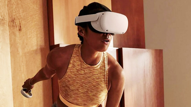 A Woman Wearing Meta Quest 2 All in One Wireless VR Headset