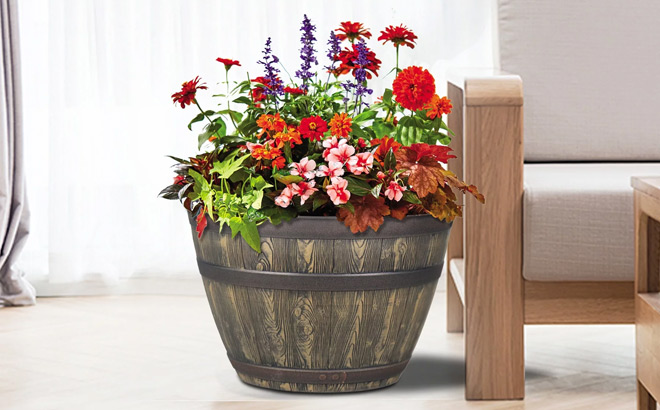 Better Homes Gardens Brown Resin Whiskey Barrel Planter on the Floor