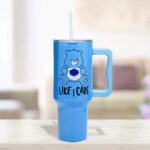 Care Bears Stainless Steel Travel Cup on a Table