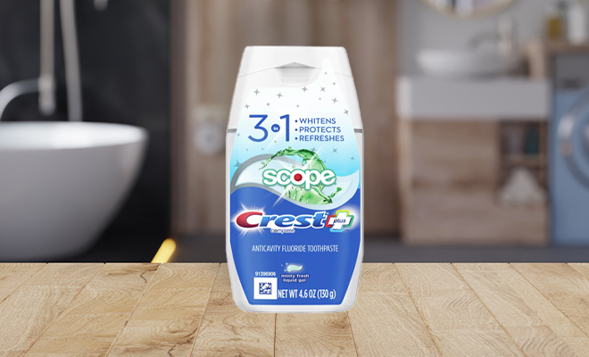 Crest Complete Plus Scope 3 In 1 Whitening Liquid Gel Toothpaste 4 6 oz on a Bathroom Counter