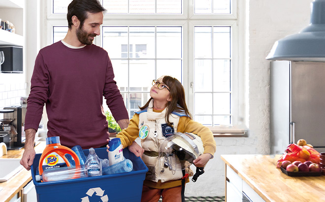 Father and Daughter Holding a Basket of PG Products